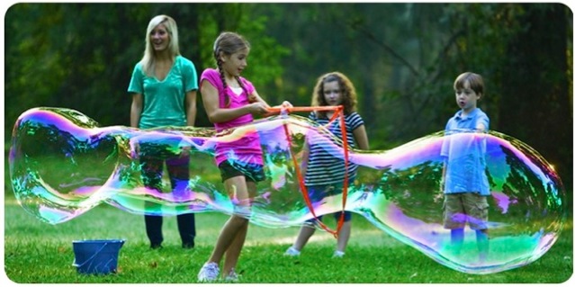 Girl Blowing BIG Bubbles